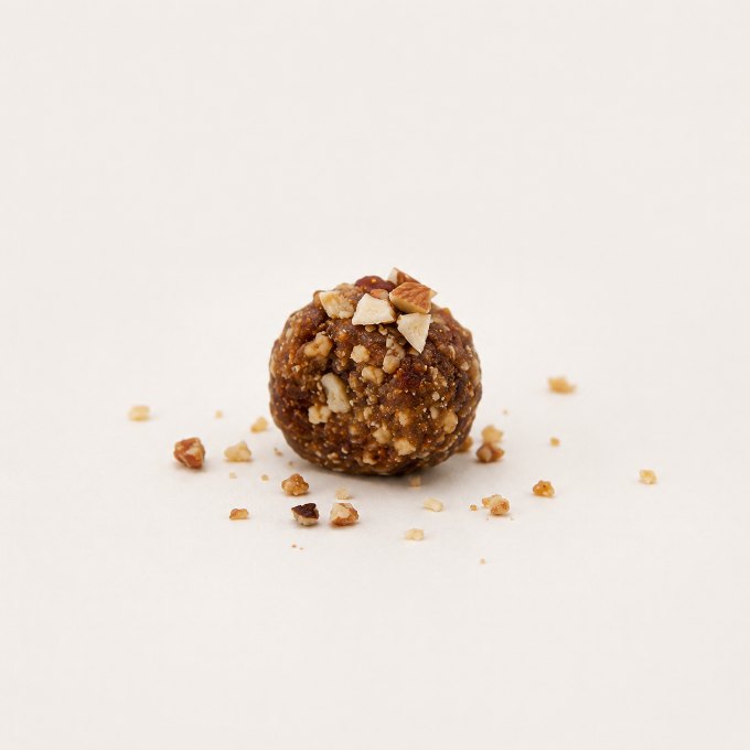 Dink Paushtik Ladoo being eaten, frame 4